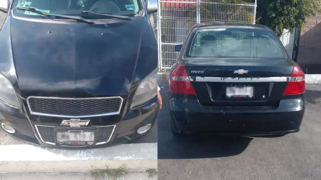 Elementos de la SSPMQ resguardan el automóvil localizado en la colonia La Loma.